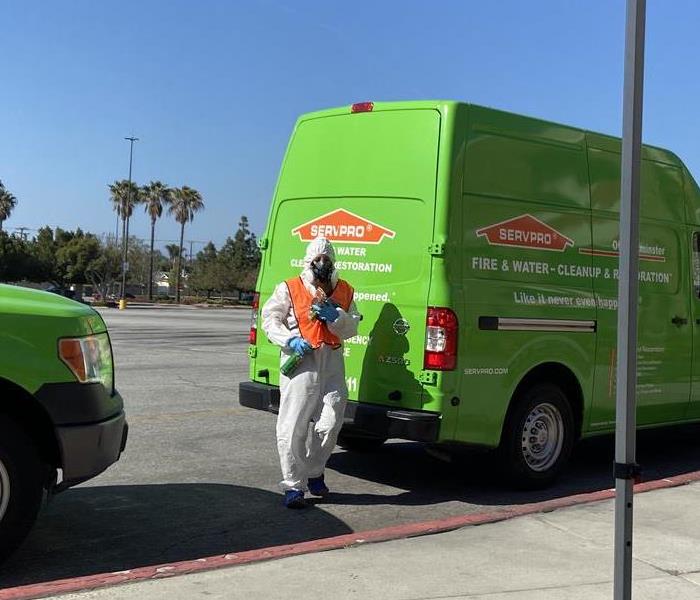 SERVPRO employee with gear to perform precautionary cleaning 