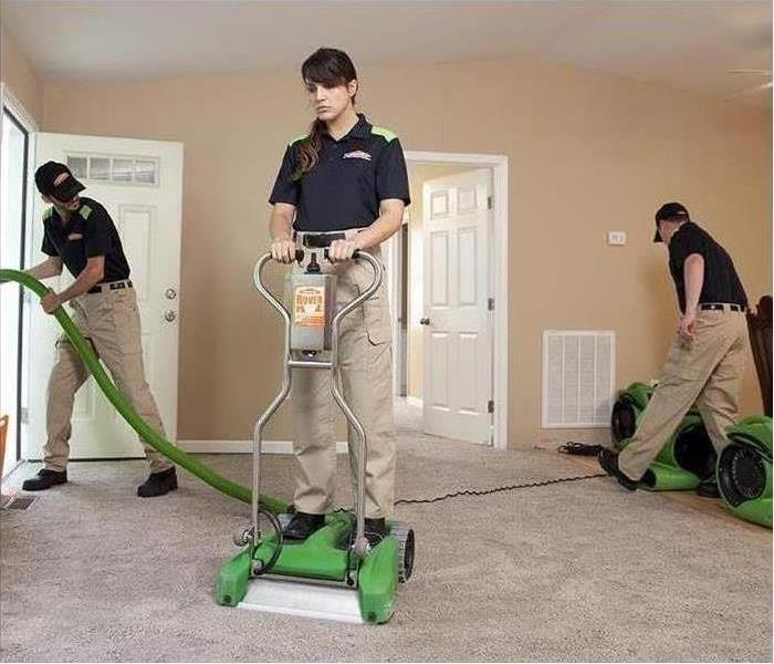 SERVPRO workers cleaning 